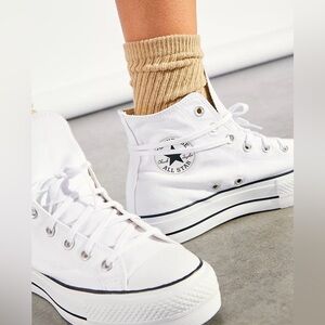 Converse New. Platform shoe size 7.  White